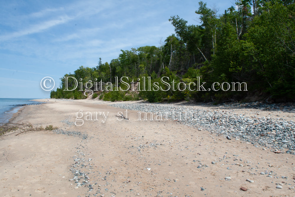 Walking along the white sandy shore in Grand Marais, digital Grand MArais