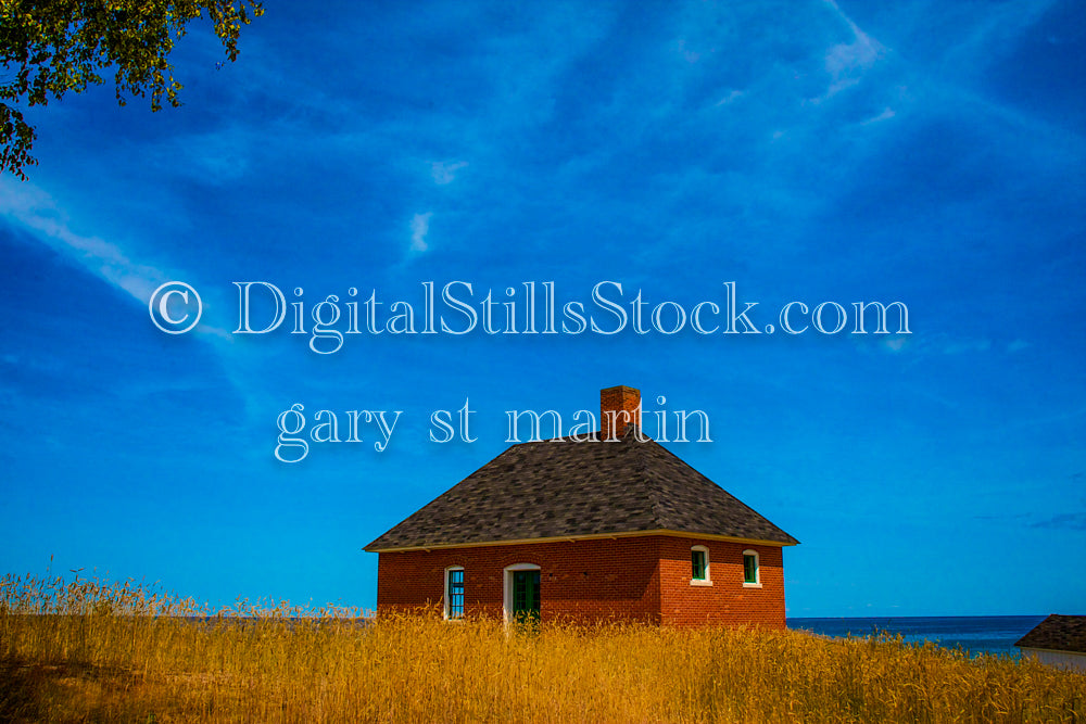 Red brick house in the brown grass, digital Grand Marais