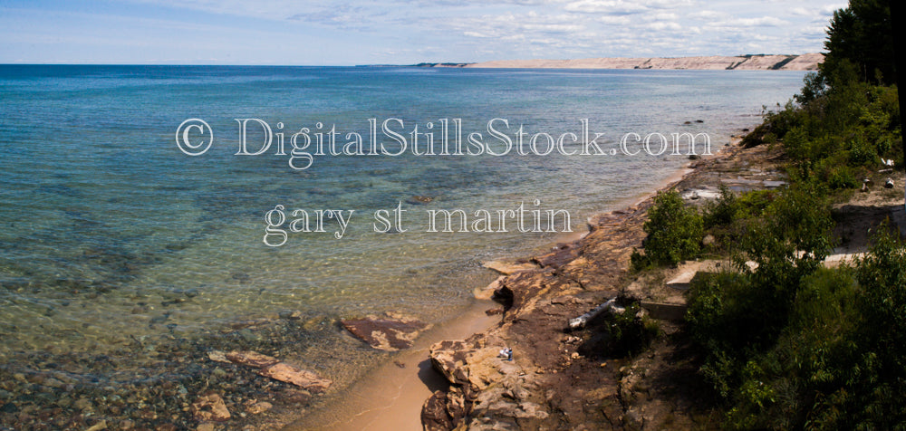 Wide view of the calm rocky lakeside, digital wide views