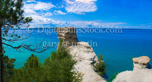 Wide view of rocks high above the water, digital wide views