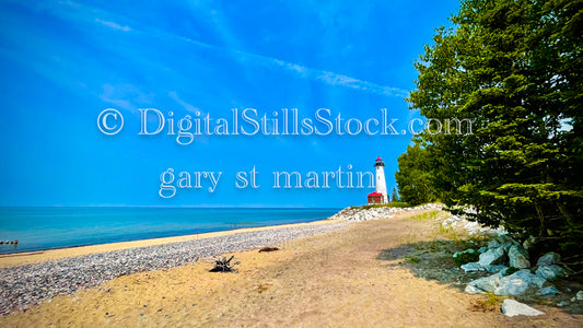 Wide angle view of the Lighthouse from the back of the beach, digital Crisp Point