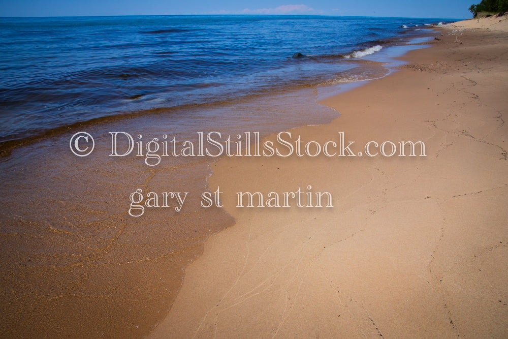 Closeup of the waves washing up on the shore line of Lake Superior, digital grand marais