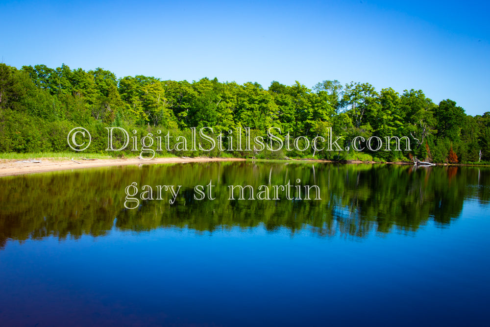 Trees reflections along the shoreline of Sable Lake, digital grand marais