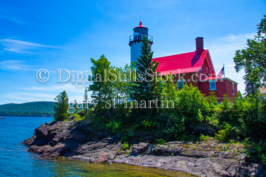 Red Lighthouse right on the water, digital Copper Harbor