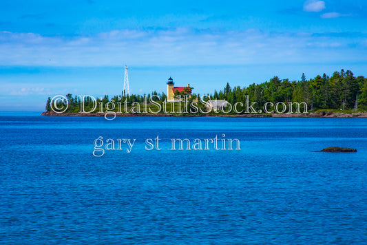 Looking at the lighthouse across the water, digital Copper Harbor