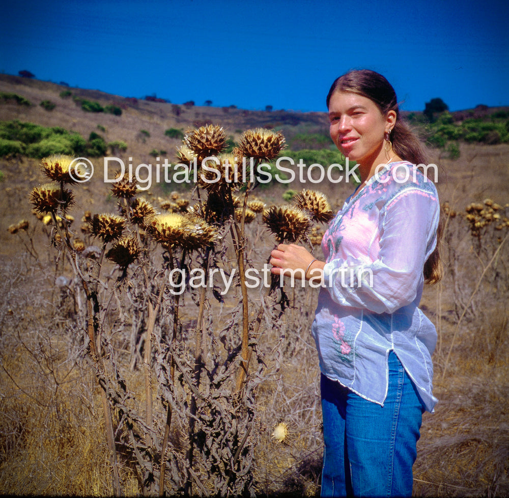 Closer view of Carolyn Cavalier, Standing in a field of dried flowers, CA, Analog, Color, People, Women