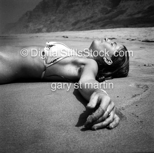 Caroline Laying down in the Sand