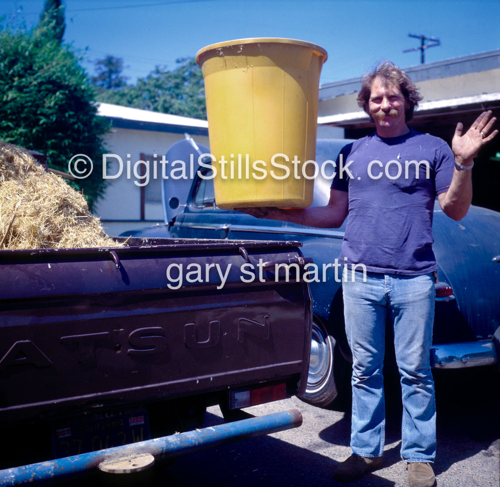 Mike Dowell, hand up, holding up container, portraits, color, analog