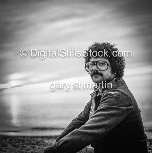 Man With Glasses At The Beach 