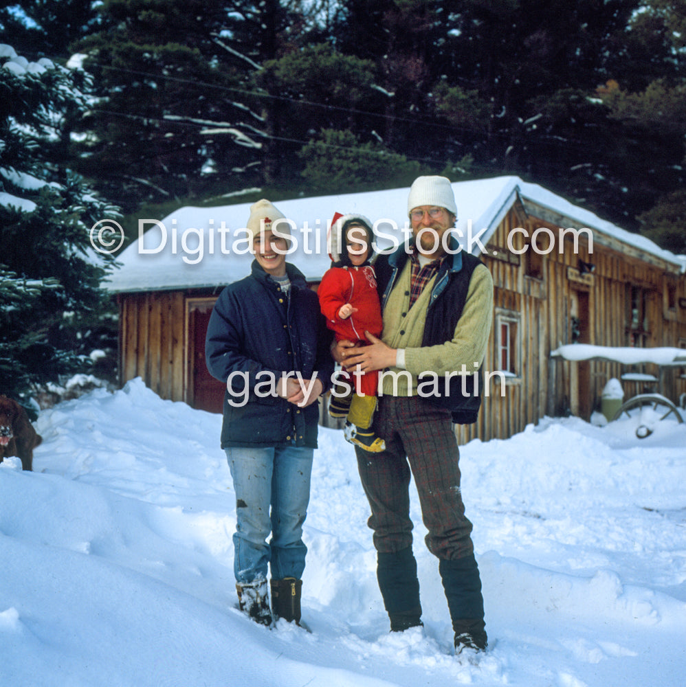Happy Family In The Snow